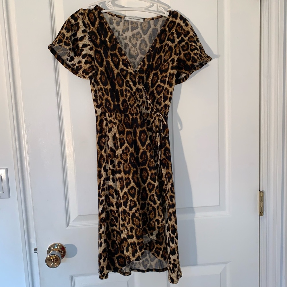 Caution To The Wind Leopard Print Midi Dress crossover design flattering size XS